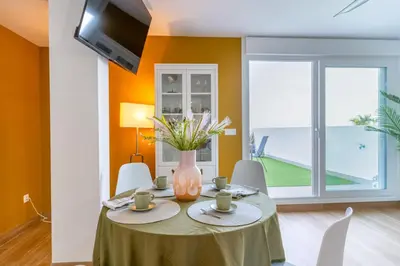 Una televisión o centro de entretenimiento en Apartamento Buenavista Playa Sol R&R