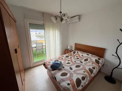 Cama o camas de una habitación en Aguadulce SOL y PLAYA- A/C