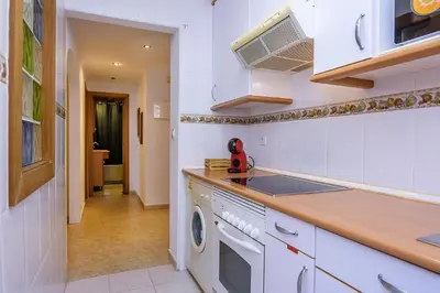 Una cocina o zona de cocina en Águilas Delicias Piscina Wifi AC Parking Gratis