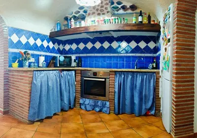 Una cocina o zona de cocina en Casa Cueva The Exclusive Royal Andalusian Cave