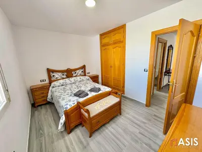 Cama o camas de una habitación en Apartamento asis B