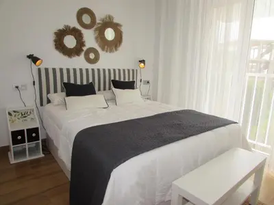 Cama o camas de una habitación en PUERTA DE ORIENTE BEACH HOME