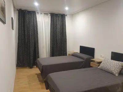 Una televisión o centro de entretenimiento en ALANDALUSTHALASSA.COM Apartamento con hermosas vistas