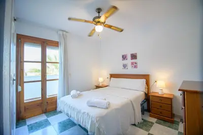 Cama o camas de una habitación en Mediterranea 6 tus momentos junto al mar Las Conchas