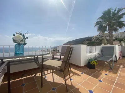 Un balcón o terraza de RESIDENCIAL OASIS 5