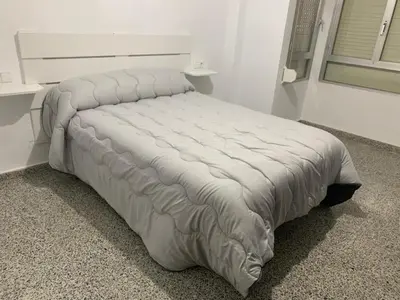 Cama o camas de una habitación en Piso céntrico