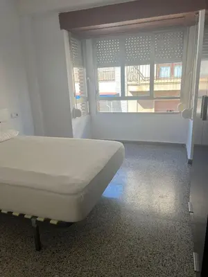 Cama o camas de una habitación en Piso céntrico