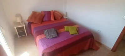Cama o camas de una habitación en adosado con piscina en Cabo de Gata 4p