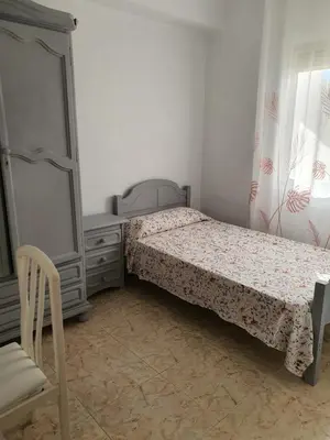 Cama o camas de una habitación en Piso cerca playa Almeria