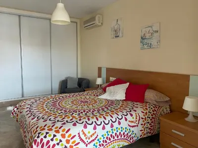 Cama o camas de una habitación en Apartamento Portofino Sun & Beach