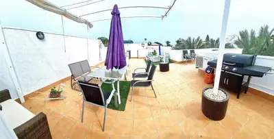 Zona de estar de Atico en Puerto Rey Urbanizacion La Aldea