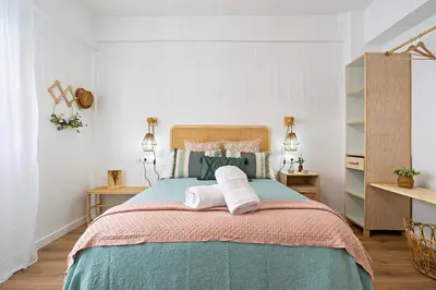 Cama o camas de una habitación en APARTAMENTO BELLAVISTA beach