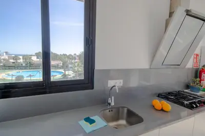 Una cocina o zona de cocina en Laberinto 25 Puerto Rey