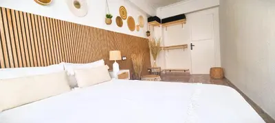 Cama o camas de una habitación en WABI BEACH LUXURY HOUSE - Excelente Ubicacion!! Centro y Frente a Playa Colonia con Aire