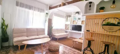 Una televisión o centro de entretenimiento en WABI BEACH LUXURY HOUSE - Excelente Ubicacion!! Centro y Frente a Playa Colonia con Aire