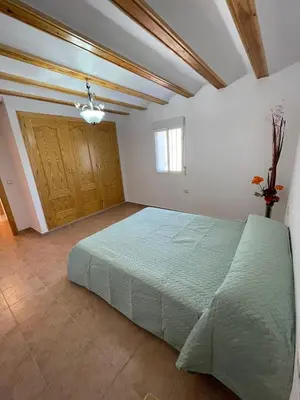Cama o camas de una habitación en Casa Rural Las Cales
