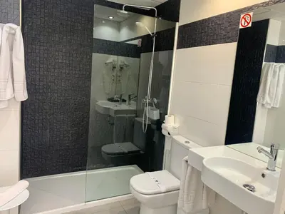 Un baño de Hospedium Hotel Continental