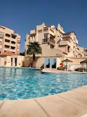 Piscina en o cerca de Apto Roquetas con terraza, a 1min de la playa, garaje y piscina