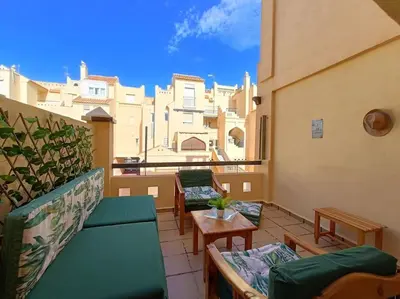 Zona de estar de Apto Roquetas con terraza, a 1min de la playa, garaje y piscina