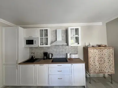 Una cocina o zona de cocina en LA CASITA VERDE- cerca de la playa y con piscina abierta todo el año