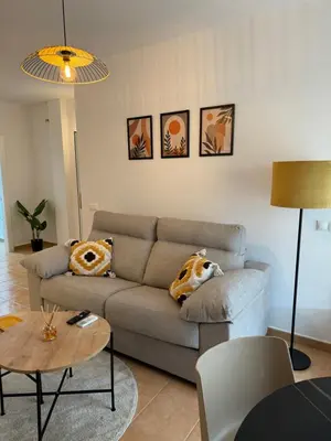 Zona de estar de Apartamentos El Llano Málaga 7