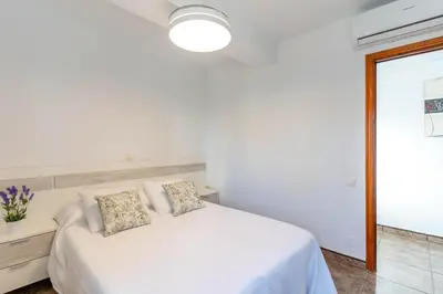 Cama o camas de una habitación en Apartamento Gaviotas II R&R