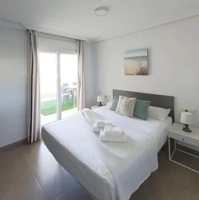 Cama o camas de una habitación en Mar y Sal 11 Suites, gran terraza con vistas al mar, 2 Hab y piscina
