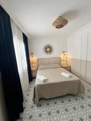 Cama o camas de una habitación en Casa Veratense Vera Playa