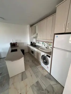Una cocina o zona de cocina en Apartamento en playa Serena