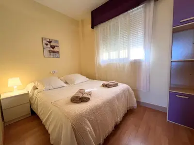 Cama o camas de una habitación en Ático con vistas al mar