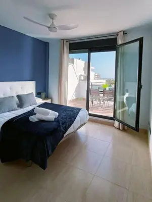 Cama o camas de una habitación en Toyo Alcazaba Suites Gran terraza y vistas, 2Hab, piscina y garaje