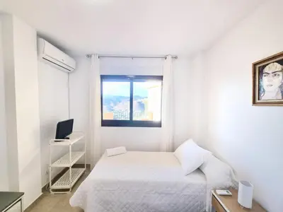 Cama o camas de una habitación en Apartamento con piscina, urbanización privada by AlohaPalma