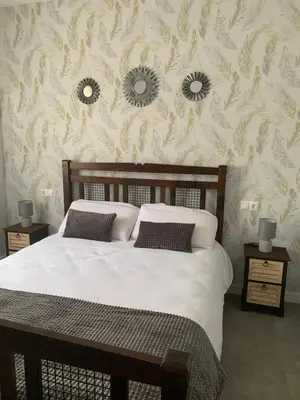 Cama o camas de una habitación en APARTAMENTO DE LUJO EN LA VERA PLAYa GARRUCHA
