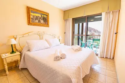 Cama o camas de una habitación en Oasis Frente al Mar, Céntrico y con Parking - By Aloha Palma