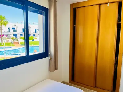 Cama o camas de una habitación en Apartamento Perla Playa