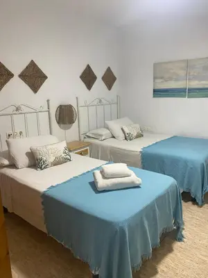 Cama o camas de una habitación en Almeria playa Zapillo