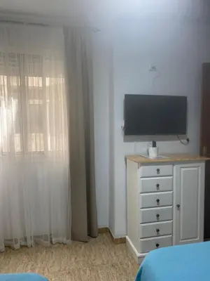 Una televisión o centro de entretenimiento en Almeria playa Zapillo