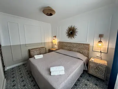 Cama o camas de una habitación en Vera Costa cerca de la playa