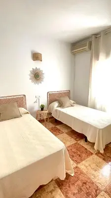 Cama o camas de una habitación en Villa Garriga