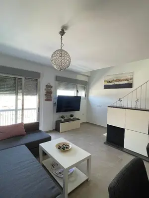 Una televisión o centro de entretenimiento en Capital Seaview