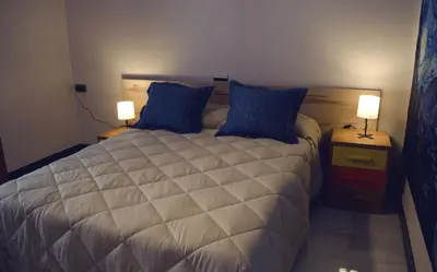 Cama o camas de una habitación en Casa del Sol y la Luna Apartamento Atardecer