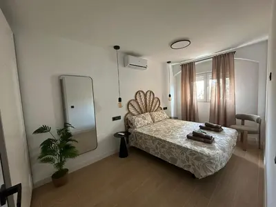 Cama o camas de una habitación en Apartamentos Fénix