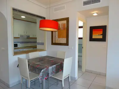 Una cocina o zona de cocina en ÁTICO NUEVO VERA SOLARiUM URBANIZACION A PIE DE PLAYA