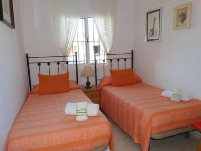 Cama o camas de una habitación en ATICO VERAMAR 5 JUNTO A LA PLAYA WiFi-SMART-TV