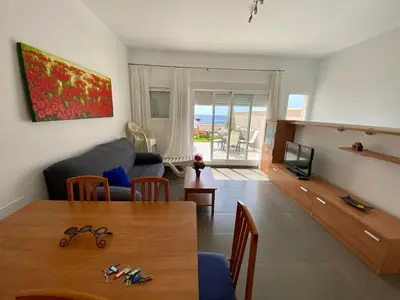Zona de estar de Candela 55 Dúplex con terraza y piscina