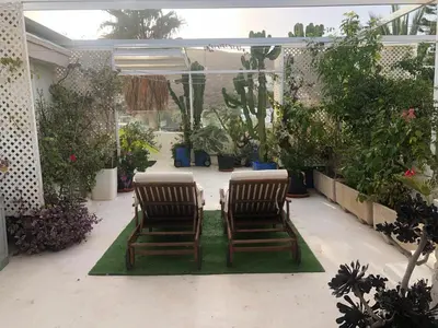 Jardín al aire libre en El Jardín del Camaleón