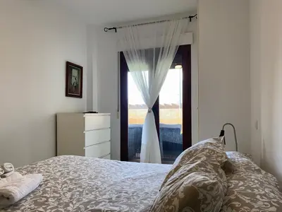 Cama o camas de una habitación en VERA Mar y Jardín