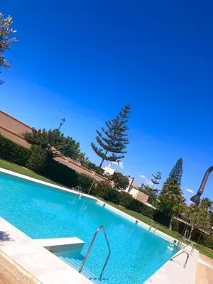 Piscina en o cerca de VIVE la PLAYA a 5 min con VISTAS-PISCINA-AIRE ACONDICIONADO-VENTILADORES DE TECHO-WIFI-Orientacion Sur
