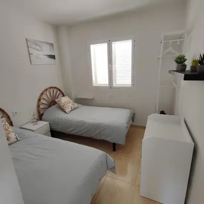 Cama o camas de una habitación en Apartamento Reformado con vistas al Mar