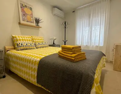 Cama o camas de una habitación en Bonito y acogedor apartamento en Tíjola